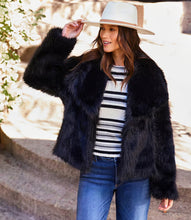 Load image into Gallery viewer, Discover our Flanna Faux Fur Coat, an essential addition to your seasonal wardrobe. Designed with a luxuriously soft texture, this coat is ideal for chilly days. It offers a generous fit for ease of movement and the option to layer underneath.