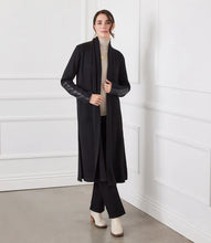 Load image into Gallery viewer, Discover our Faux Leather Patch Duster, an ideal complement to your cool-weather collection. Crafted with an extended length, this duster offers both protection and warmth without compromising on style. It boasts a vegan leather patch sleeve, making it an impeccable choice for both a laid-back day or an evening in the city.