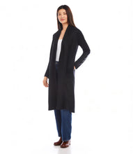 Load image into Gallery viewer, Discover our Faux Leather Patch Duster, an ideal complement to your cool-weather collection. Crafted with an extended length, this duster offers both protection and warmth without compromising on style. It boasts a vegan leather patch sleeve, making it an impeccable choice for both a laid-back day or an evening in the city.