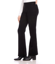 Load image into Gallery viewer, The faux suede material and raw edge detail of these bootcut pants add both a touch of luxury and stylish edge, making them a must-have for the cold weather season. They are perfect for both work and a night out and can easily be paired with your preferred boots or heels for a versatile and chic look.