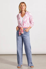 Load image into Gallery viewer, Add a dash of fresh floral fun to your wardrobe with this long-sleeve button-up featuring a border print on its lower half. High slits, an elegant bal collar, and stretch-infused fabric make this a winning choice. Wear long, closed or open or tied at the waist.