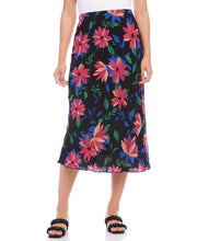 Load image into Gallery viewer, A vibrant floral print enhances the romantic charm of this swingy bias cut skirt in a stylish midi length. It features an easy pull-on silhouette that flows away from the body in streamlined sophistication. Colors- Black, blue, green, pinks. Lined. Bias cut. Elasticized waistband. Fabric- 100% Rayon. Care- Dry clean.