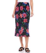 Load image into Gallery viewer, A vibrant floral print enhances the romantic charm of this swingy bias cut skirt in a stylish midi length. It features an easy pull-on silhouette that flows away from the body in streamlined sophistication. Colors- Black, blue, green, pinks. Lined. Bias cut. Elasticized waistband. Fabric- 100% Rayon. Care- Dry clean.