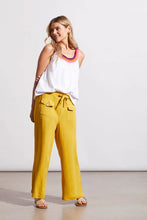 Load image into Gallery viewer, Experience the laid-back lifestyle of spring/summer with this charming flowy sleeveless top featuring a crochet neckline. Made from cotton, you'll stay stylish and comfortable on warmer days. Change up the look by layering this fabulous top under a cardigan or jacket.