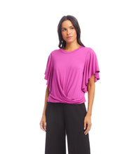 Load image into Gallery viewer, Discover effortless elegance with the Fia Flutter Sleeve Drape Front Top by Karen Kane. Designed with soft, flowing flutter sleeves and a beautifully draped front, this top creates a flattering silhouette with a touch of sophistication. Whether styled with tailored trousers for work or denim for a chic casual vibe, this versatile blouse is a must-have for any wardrobe. Perfect for day-to-night styling, this lightweight drape-front top pairs beautifully with skirts, jeans, or structured pants.