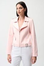 Load image into Gallery viewer, Woman wearing a light pink jacket and white pants against a white background.