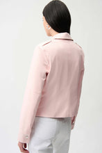 Load image into Gallery viewer, Woman wearing a light pink jacket and white pants against a white background.