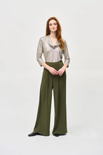 Load image into Gallery viewer, Display your distinctive style with this striking melange knit top. The cowl neck brings an element of elegance, and the three-quarter sleeves offer remarkable versatility. Its straight silhouette promises a flattering fit that combines comfort with fashion.