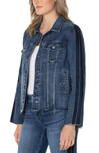 Load image into Gallery viewer, The timeless jean jacket gets a modern edge with a frayed hem and velvet trim adorning the silhouette. Its versatility makes it ideal for a range of occasions and it can easily be elevated when paired with the coordinating Hannah Crop Flare. Color- Gilmore; dark blue with fading. Button front closure. Velvet trim down arms. Elevated frayed hem details. Flap patch pockets.