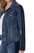 Load image into Gallery viewer, The timeless jean jacket gets a modern edge with a frayed hem and velvet trim adorning the silhouette. Its versatility makes it ideal for a range of occasions and it can easily be elevated when paired with the coordinating Hannah Crop Flare. Color- Gilmore; dark blue with fading. Button front closure. Velvet trim down arms. Elevated frayed hem details. Flap patch pockets.