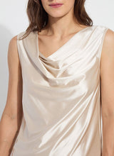 Load image into Gallery viewer, Made from Stretch Satin Jersey, the sleeveless Freida Draped Top offers a slim fit, hip length and asymmetrically draped neckline. Bringing timeless appeal, this elevated blouse looks like silk, while offering the stretchy comfort of Jersey. Pair it with our Baby Bootcut Ankle Denim in Beige.