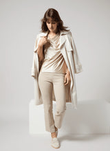 Load image into Gallery viewer, Made from Stretch Satin Jersey, the sleeveless Freida Draped Top offers a slim fit, hip length and asymmetrically draped neckline. Bringing timeless appeal, this elevated blouse looks like silk, while offering the stretchy comfort of Jersey. Pair it with our Baby Bootcut Ankle Denim in Beige.