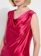 Load image into Gallery viewer, Made from Stretch Satin Jersey, the sleeveless Freida Draped Top offers a slim fit, hip length and asymmetrically draped neckline. Bringing timeless appeal, this elevated blouse looks like silk, while offering the stretchy comfort of Jersey. Pair it with our Baby Bootcut Ankle Denim in White.