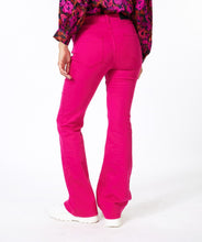 Load image into Gallery viewer, Let your fashion sense come alive with our Fuchsia Colored Flair Denim Trousers. With a modern construction and flair cut, these trousers deliver a bold, feminine style. Offering a flattering fit, EsQualo's quality denim fabric ensures this denim trouser remains comfortable to wear. Not limited to any one look, match our Felizia with a relaxed top or chic blouse for a unique, hassle-free ensemble.
