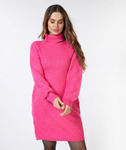 Load image into Gallery viewer, Experience the sleek combination of fashion and comfort offered by our Fiona dress. Enjoy the sophisticated rib pattern that provides a modern silhouette. This dress exudes elegance and adds a fashionable touch to any event. Color- Fuchsia. Rib pattern. Pullover dress.