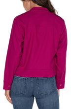 Load image into Gallery viewer, The Florie Fuchsia Kiss Utility Crop Jacket by Liverpool Los Angeles is designed for the stylish woman looking to incorporate the utility jacket trend into her wardrobe. Made from our soft touch twill material, it offers both comfort and stretch, while adding a touch of playfulness and edginess to your outfit choices. With its versatile styling, it is the perfect choice for any minimal yet trendy look.
