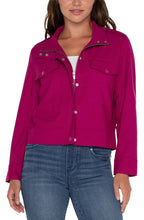 Load image into Gallery viewer, The Florie Fuchsia Kiss Utility Crop Jacket by Liverpool Los Angeles is designed for the stylish woman looking to incorporate the utility jacket trend into her wardrobe. Made from our soft touch twill material, it offers both comfort and stretch, while adding a touch of playfulness and edginess to your outfit choices. With its versatile styling, it is the perfect choice for any minimal yet trendy look.