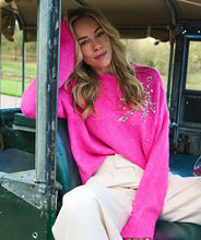 Load image into Gallery viewer, Expertly crafted, the Esqualo Cerise Pink Sweater perfectly combines comfort and sophistication. This oversized, cozy garment is embellished with elegant rhinestones, adding a touch of glamour to any outfit. It will make a statement while keeping you warm. Pair it effortlessly with jeans or skirts for a head-turning look.