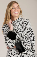 Load image into Gallery viewer, Stand out in style with this Frady Funnel Abstract Cape from Tyler and Boe. The black and white design exudes a modern but classic feel, while the faux fur trim adds a touch of luxury. You definitely will make a fashion statement when you walk into a room wearing this gorgeous top.