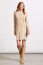 Load image into Gallery viewer, This funnel neck sweater dress is the epitome of modern elegance, offering a harmonious mix of avant-garde fashion and unparalleled comfort. Its striking jacquard pattern ensures you stand out in any crowd, complemented by the refined look of set-in long sleeves and a gently contoured silhouette. The functional side pockets, accented with contrasting trim, add a dash of visual flair.