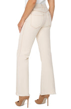 Load image into Gallery viewer, Presenting the updated Gia Glider®—now featuring a fashionable flare and frayed hem. The subtle flare creates a sleek, elongated silhouette ideal for any occasion.