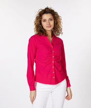 Load image into Gallery viewer, An amazing fuchsia color adorns this sleek, stretch fabric to create a sophisticated blouse that is sure to provide you compliments. Shiny, gold buttons add a pop of elegance to this stunning top. A gathered front adds extra glamour. Pair with a pair of white or black pants for a more formal look or wear with your favorite denim on casual days.