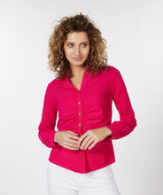 Load image into Gallery viewer, An amazing fuchsia color adorns this sleek, stretch fabric to create a sophisticated blouse that is sure to provide you compliments. Shiny, gold buttons add a pop of elegance to this stunning top. A gathered front adds extra glamour. Pair with a pair of white or black pants for a more formal look or wear with your favorite denim on casual days.