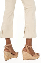 Load image into Gallery viewer, The chic Gia Glider Crop Flare with Back Pleat features a flattering mid-rise fit, a wide crop flare, and a unique back pleat detail that adds a touch of sophistication. Designed with a blend of polyester, cotton, and spandex, it offers both comfort and durability. Perfect for transitioning from office wear to evening outings, this versatile pant is a wardrobe essential.