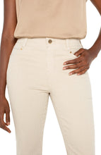 Load image into Gallery viewer, The chic Gia Glider Crop Flare with Back Pleat features a flattering mid-rise fit, a wide crop flare, and a unique back pleat detail that adds a touch of sophistication. Designed with a blend of polyester, cotton, and spandex, it offers both comfort and durability. Perfect for transitioning from office wear to evening outings, this versatile pant is a wardrobe essential.