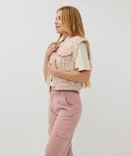 Load image into Gallery viewer, Add a touch of timeless elegance to your wardrobe with this exquisite tweed waistcoat. Featuring a blend of warm sand tones, off-white, delicate chalk pink and gold metallic treading, this vest offers a refined, versatile look that’s perfect for layering. Designed for both comfort and style, it pairs effortlessly with trousers, skirts, or dresses to create polished ensembles for any occasion.
