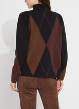Load image into Gallery viewer, The distinctive Greta Pullover Sweater, made from soft Knit Jacquard, features a sleek funnel neck, shimmering Copper Lurex highlights, side slits with Vegan Suede detailing, and a sophisticated high-low hem. It pairs perfectly with brown or black bottoms for a timeless style, or with denim for a casual vibe.