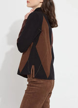 Load image into Gallery viewer, The distinctive Greta Pullover Sweater, made from soft Knit Jacquard, features a sleek funnel neck, shimmering Copper Lurex highlights, side slits with Vegan Suede detailing, and a sophisticated high-low hem. It pairs perfectly with brown or black bottoms for a timeless style, or with denim for a casual vibe.