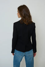 Load image into Gallery viewer, Person wearing a black blazer and blue jeans against a white background.
