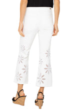 Load image into Gallery viewer, The Hannah Crop Flare with Fray Hem from Liverpool Los Angeles is the perfect blend of chic and contemporary fashion. Featuring delicate embellished floral details, this flattering silhouette adds a stylish touch to any wardrobe. Designed for versatility, these high-rise crop flare jeans offer a comfortable fit while making a statement with their unique frayed hem.