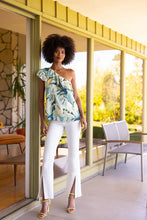 Load image into Gallery viewer, One of our favorite jeans this season, designed with vintage-like characteristics to give a rigid look while keeping comfort in mind. A high waisted silhouette, slim fit and flared leg offers a sleek and elongating look. A flattering twisted side slit at the hem take this jean to a new level! Dress it up with a beautiful blouse and heels or down with a classic tee and sneakers. 