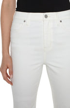 Load image into Gallery viewer, One of our favorite jeans this season, designed with vintage-like characteristics to give a rigid look while keeping comfort in mind. A high waisted silhouette, slim fit and flared leg offers a sleek and elongating look. A flattering twisted side slit at the hem take this jean to a new level! Dress it up with a beautiful blouse and heels or down with a classic tee and sneakers. 