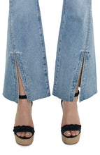 Load image into Gallery viewer, One of our favorite jeans this season, designed with vintage-like characteristics to give a rigid look while keeping comfort in mind. A high-waisted silhouette, slim fit and flared leg offer a sleek and elongating look. A twisted side slit at the hem take this jean to a new level! Dress it up with a blazer and heels or dress down with a classic tee and sneakers. 