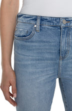 Load image into Gallery viewer, One of our favorite jeans this season, designed with vintage-like characteristics to give a rigid look while keeping comfort in mind. A high-waisted silhouette, slim fit and flared leg offer a sleek and elongating look. A twisted side slit at the hem take this jean to a new level! Dress it up with a blazer and heels or dress down with a classic tee and sneakers. 