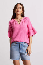 Load image into Gallery viewer, This lovely blouse is made of crinkled gauze cotton, which gives it a light and elegant touch. It features a notch neck that you can pop over, elbow-length raglan sleeves, and bell-shaped cuffs that add some playful charm.