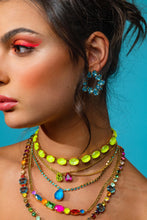 Load image into Gallery viewer, These Iman Earrings are a real conversation starter! Antique gold plated brass base keeps them looking as good as they feel, with high-quality crystals adding a sparkle to your style. Plus, their surgical steel posts make them as comfortable as they are impressive. Canadian - made!