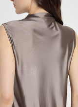 Load image into Gallery viewer, Made from wrinkle-free stretch satin jersey, the sleeveless Irina Satin Jersey Turtleneck Top showcases a mock neck and front drape. The fitted Irina Turtleneck coordinates well with our Amelia Moto Jacket in Copper Chevron and our Genesis Stretch Woven Pant in Cosmic Ash.