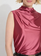 Load image into Gallery viewer, Crafted from wrinkle-resistant stretch satin jersey, the sleeveless Irina Satin Jersey Top features a mock neck and an elegant front drape. The fitted Irina, presented in a vibrant peony shade, serves as an ideal layer beneath a cherished jacket or blazer.