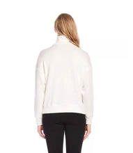 Load image into Gallery viewer, Discover the seamless blend of style and comfort with our Faux Wrap Turtleneck. Crafted from a plush sweater knit, this top offers a relaxed fit that complements every figure. Elevate your closet collection and enjoy all-day warmth and coziness!