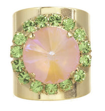 Load image into Gallery viewer, This bold, adjustable ring is made from light gold-plated brass base metal and is covered with twinkling high-quality crystals. The 12mm stone adds an extra touch of glamour and sparkle. Whether you're dressing up for a night out or adding a bit of bling for a special occasion, this made in Canada piece will make you shine. Color- Gold, light pink, mint. High quality crystals. Gold plating over brass. 12 mm mint stone surrounded by smaller fuchsia stones.