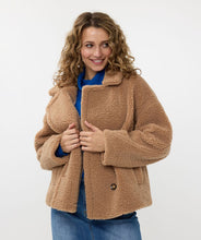 Load image into Gallery viewer, Wrap yourself in a stylish jacket that feels like a teddy bear hug. Our Teddy jacket is a stylish and cozy oversized piece. It boasts four buttons and trendy stitching details on the trim. Not only is this jacket fashionable, but it's also warm, making it an ideal choice for your autumn collection.