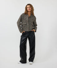 Load image into Gallery viewer, Introducing the EsQualo Tweed Bomber Jacket in black, a stylish and versatile piece featuring a subtle multicolor yarn and lurex. This jacket is the perfect combination of boldness and chic elegance, bringing a unique texture and shimmer to your wardrobe. Dress it up with a skirt or trouser or keep it casual with denim.
