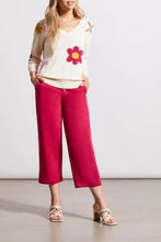 Load image into Gallery viewer, This darling lightweight sweater is a delightful choice for cool spring mornings and evenings. This V-neck features a charming floral design on the front, while the back boasts trendy colorful stripes. With its pop-over style and three-quarter sleeves, it’s both comfortable and stylish. 