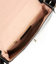 Load image into Gallery viewer, The Jacqueline is an ideal shoulder bag for any event. It is designed with high-grade vegan leather and adjustable vegan leather strap. The turn-lock closure and flap opening provide secure storage for items. Color- Emerald green. Turn lock flap closure. Side pocket and zip closure inside. Adjustable strap. Vegan leather. Vegan leather strap.