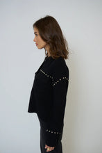 Load image into Gallery viewer, Woman wearing a black jacket with silver stud embellishments against a white background.