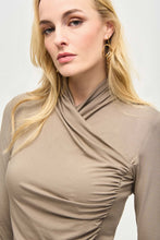 Load image into Gallery viewer, Indulge in understated glamour with this beautiful jersey knit top. The wrap neckline and long sleeves pair to perfection to add poise and a timeless elegance to this design. Delicate side shirring compliments the garment’s alluring fitted silhouette and creates a look that can seamlessly transition from day to night.